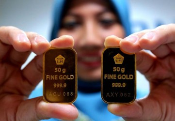 Harga Emas Antam Naik Rp7.000 per Gram