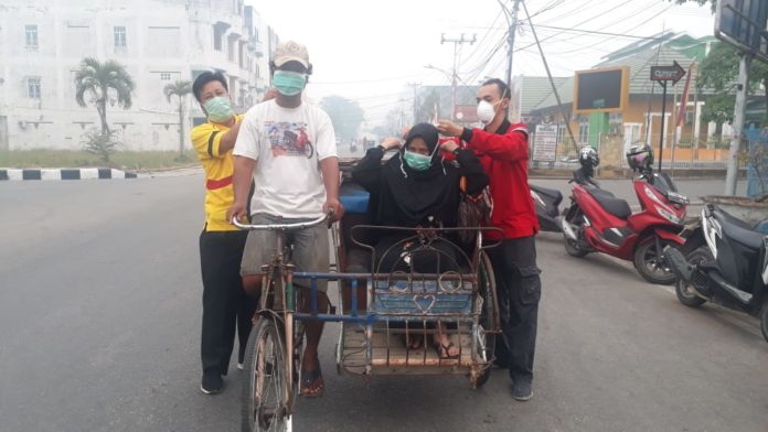 PPNI Inhil Laksanakan Bakti Sosial Pembagian Masker ke Masyarakat