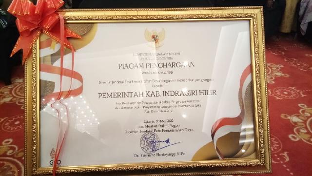 DPMD Inhil Terima Penghargaan dari Kemendagri